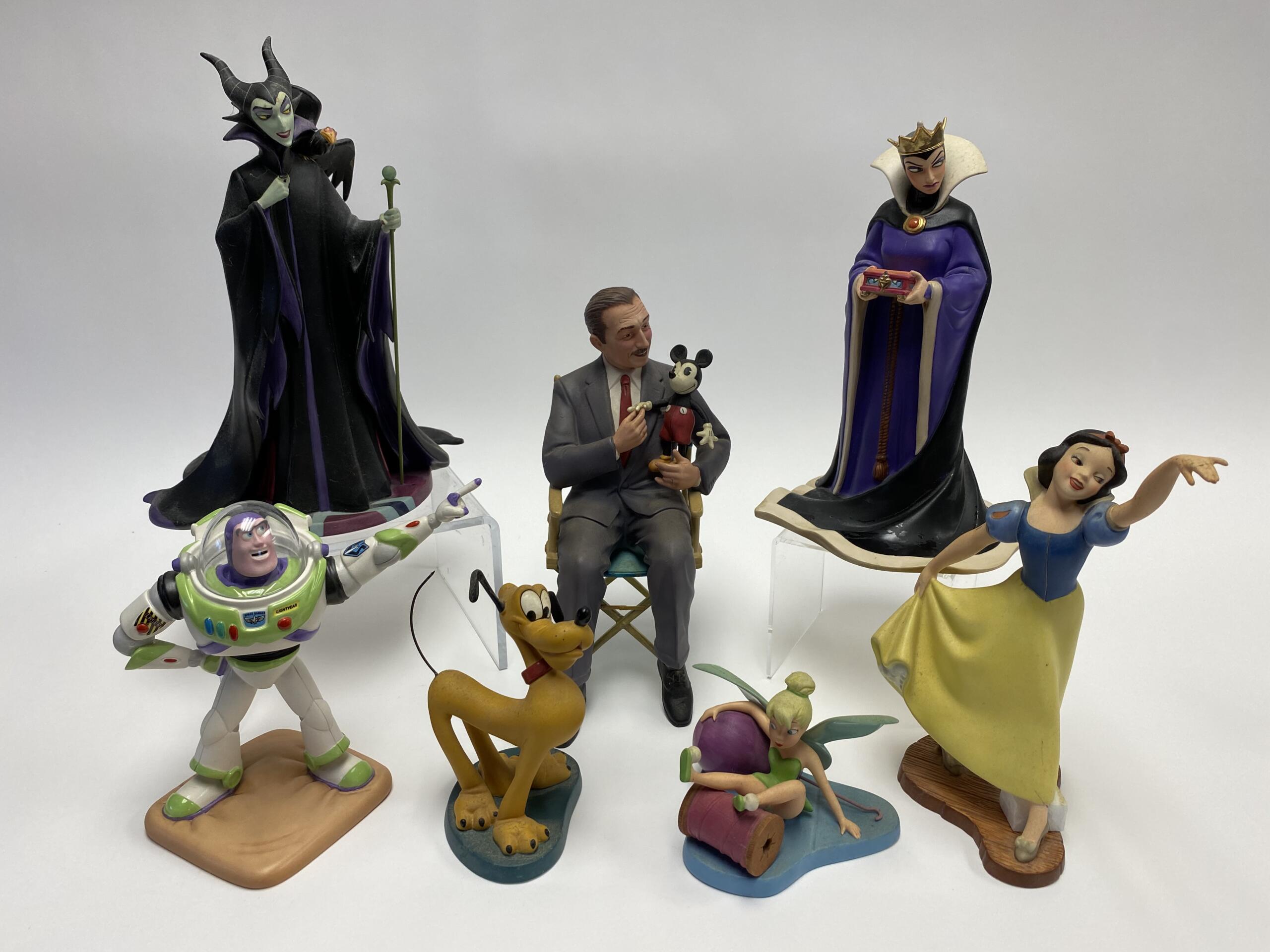 Disney Collectibles, watches, delicate figurines - Tom Hall Auctions, Inc.
